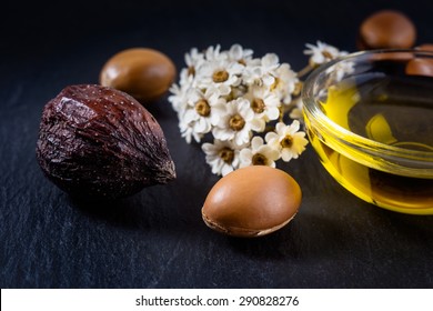 Argan Fruits And Seed With Argan Oil