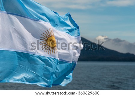 Argentina flag with mountains in background