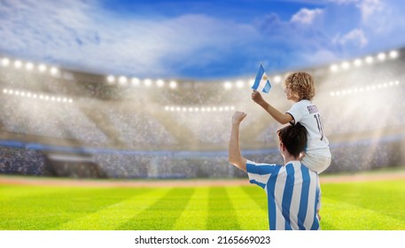 Argentina football supporter on stadium. Argentinian fans on soccer pitch watch team play. Group of supporters with flag and national jersey cheering for Argentina. Championship game. Vamos Argentina