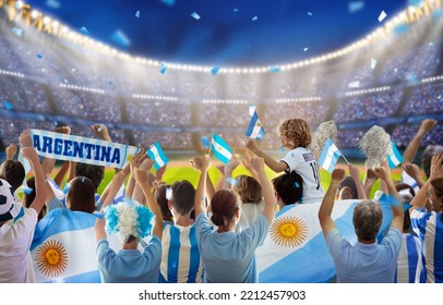 Argentina football supporter on stadium. Argentinian fans on soccer pitch watch team play. Group of supporters with flag and national jersey cheering for Argentina. Championship game. - Shutterstock ID 2212457903