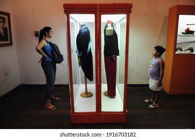 Tucumán, Argentina - January 26, 2010: A Mother And Her Daughter Look At A Display Case In The 