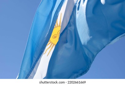 
Argentine Flag Waving In The Blue Sky