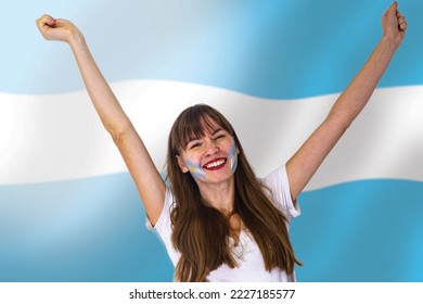 Argentine national team football fans cheering their team at the 2022 world championships, football fans with their faces painted against the country's flag; Argentina at the championships in Qatar - Powered by Shutterstock