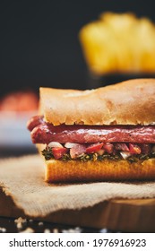 Argentinian Choripan With Chimichurri And Creole Sauce.