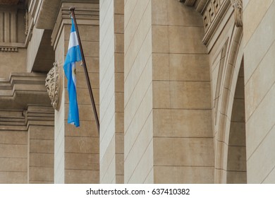 Argentinian flag side view in classical style building of the Supreme Court of Justice