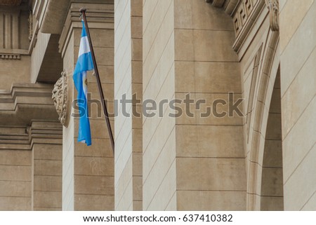 Argentinian flag side view in classical style building of the Supreme Court of Justice