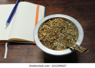 Argentinian Mate On A Table Desk On Wood And A Notebook To Write And Work In An Office