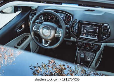 Arges, Romania - February 15 2020: Jeep Compass Limited interior cockpit view, steering wheel shot
