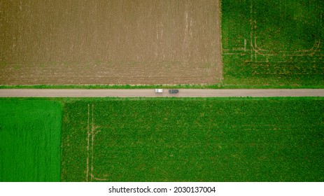 Arial Picture Of 4x4 Vehicles In Green Landscape