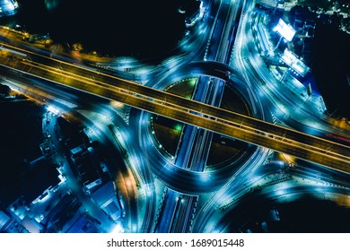 Arial Top View Of Modern Smart Transportation With Expressway, Road And Roundabout,  Road Traffic, Multilevel Junction Highway-Top View. Important Infrastructure.