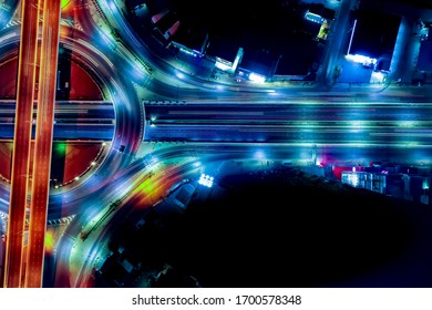 Arial Top View Of Modern Smart Transportation With Expressway, Road And Roundabout,  Road Traffic, Multilevel Junction Highway-Top View. Important Infrastructure.