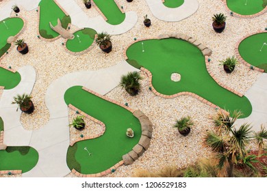 Arial View Of A Miniature Golf Course. Abstract View With Contrasting Colors.