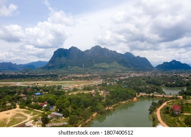 Arial view of mountain against cloud sky