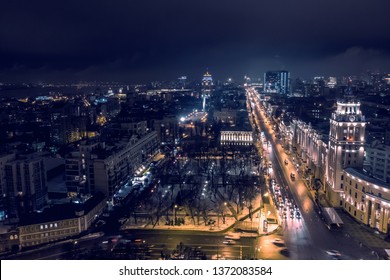 Arial View Of Night City Voronezh, Evening Cityscape With Roads, Parks And Traffic, Drone Shot, Toned