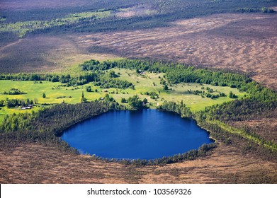 Arial View Over The Small Lake In The Swamp