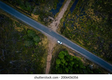Ariel View Of A Car In The Middle Of Nowhere In Finland Forest