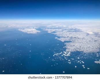 Ariel View Of Greenland Ice Sheet Melting Into Arctic Ocean