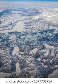 Ariel View Of Greenland Ice Sheet Melting Into Arctic Ocean