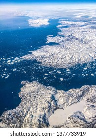 Ariel View Of Greenland Ice Sheet Melting Into Arctic Ocean