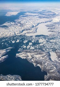 Ariel View Of Greenland Ice Sheet Melting Into Arctic Ocean