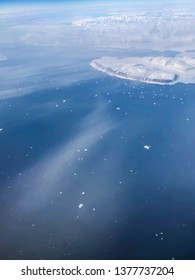 Ariel View Of Greenland Ice Sheet Melting Into Arctic Ocean