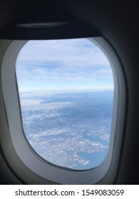 Ariel View Of The Ocean From A Plane Window 