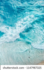 Ariel View On Beach With Waves And People. The Viewpoints At Kelingking Secret Point Beach, Nusa Penida, Indonesia.
(View From The Cliff)