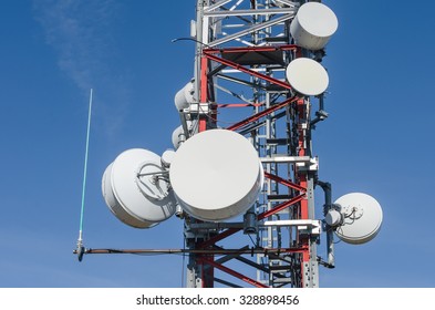 arious types of parabolic antennas and installed in a communications tower