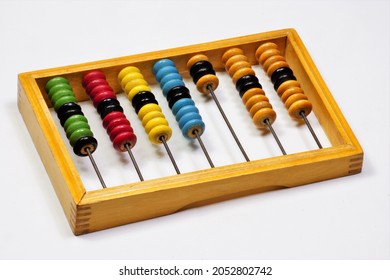 Arithmetic Abacus For School Education. Initial Training In Calculations, Addition And Subtraction. Isolated On A White Background. 