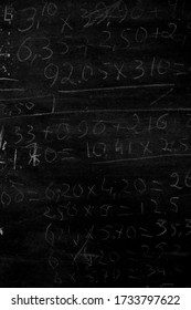 Arithmetic Operations With Rational Numbers, Additions And Subtractions, Handwritten On An Old Chalkboard During The Maths Class. Maths Against Black Chalkboard