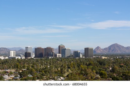 Arizona capital city of Phoenix uptown against east valley mountains