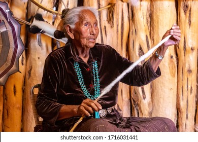 ARIZONA, USA - MARCH 29, 2020: Old Navajo woman in Navajo nation reservation at Monument Valley, Arizona, USA