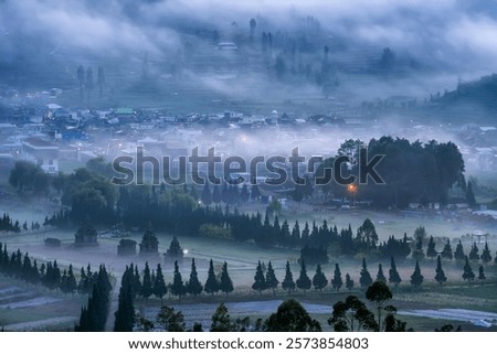 Arjuna temple in Dieng, Central Java, covered in fog in the morning