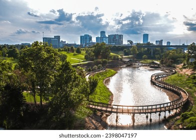 Arkansas Riverfront Park with Little Rock, AR Skyline on Cloudy Day at Presidential Park - Powered by Shutterstock