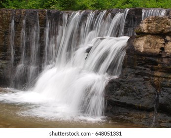 Arkansas Stream With Rocks At Natural Dam