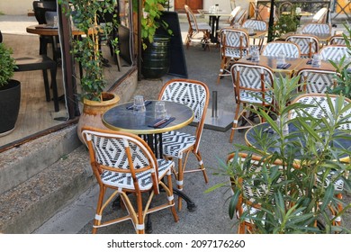 Arles City, France. Outdoor Cafe Tables In Arles.