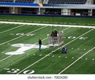 ARLINGTON - JAN 26: Unidentified Workers Prepare The Field In Cowboys Stadium In Arlington, Texas For Super Bowl XLV. Taken January 26, 2011 In Arlington, TX.