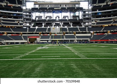 ARLINGTON - JAN 26: Unidentified Workers Prepare The Field For The Packers Steelers Super Bowl XLV In Cowboys Stadium In Arlington, Texas. Taken January 26, 2011 In Arlington, TX.