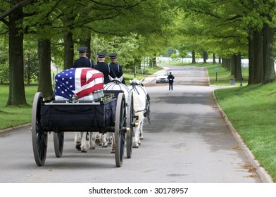 Arlington National Cemetery With Horse Drawn Caisson Carrying Flag Draped Casket