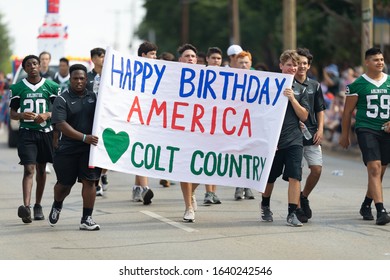 Arlington, Texas, USA - July 4, 2019: Arlington 4th Of July Parade, Members Of Arlington High School, Colts Football Team At The Parade