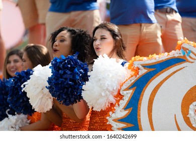 Arlington, Texas, USA - July 4, 2019: Arlington 4th of July Parade, Cheerleaders from the UT Arlington Mavericks, on a float during the parade