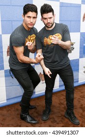 ARLINGTON, TX - APR 18: Dan Smyers (L) And Shay Mooney Of Dan + Shay Attend The Cracker Barrel Country Checkers Challenge At Globe Life Park In Arlington On April 18, 2015 In Arlington, Texas.