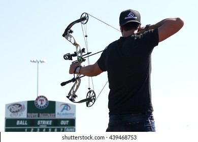 ARLINGTON, TX - APR 18: Recording Artist Luke Bryan Paticipates At The ACM & Cabela's Great Outdoor Archery Event At The Texas Rangers Youth Ballpark On April 18, 2015.