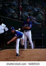 ARLINGTON, TX - JUNE 27: C.J. Wilson Warms Up In The Bullpen Before A Game Against The Anaheim Angels June 27, 2005 In Arlington, TX