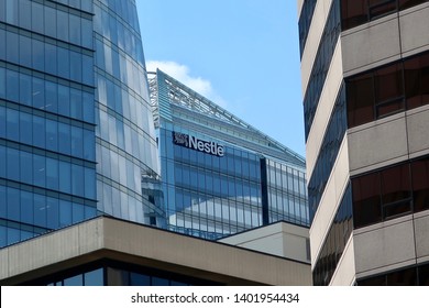 ARLINGTON, VA - MAY 19, 2019: NESTLE USA Sign On Headquarters Building Exterior