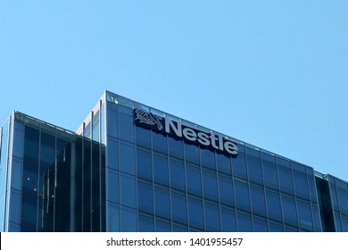 ARLINGTON, VA - MAY 19, 2019: NESTLE USA Sign On Headquarters Building Exterior