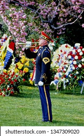 Arlington, Virginia, USA, April 14, 1981
Army Sargent Major Sounds Taps For The Last Time For General Omar Bradley, The Last Of The Five Star Generals From WW II. 