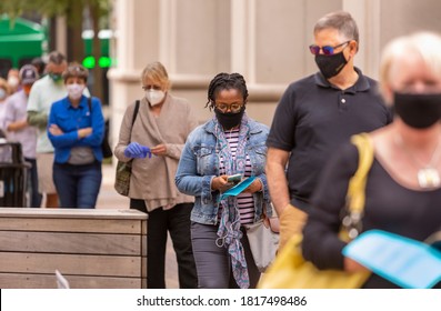 ARLINGTON, VIRGINIA, USA - SEPTEMBER 18, 2020: People Line Up During First Day Of Early Voting, 2020 Presidential Election.