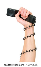 Arm And Clenched Fist, Holding A Telephone, With The Wire Wrapped Around The Arm, Illustrating The Power Of A Telephone Service, Call Center Or Phone Terror