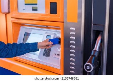 Arm Detail, Paying With Contactless From The Bank Card, At The Gas Station Payment Machine.